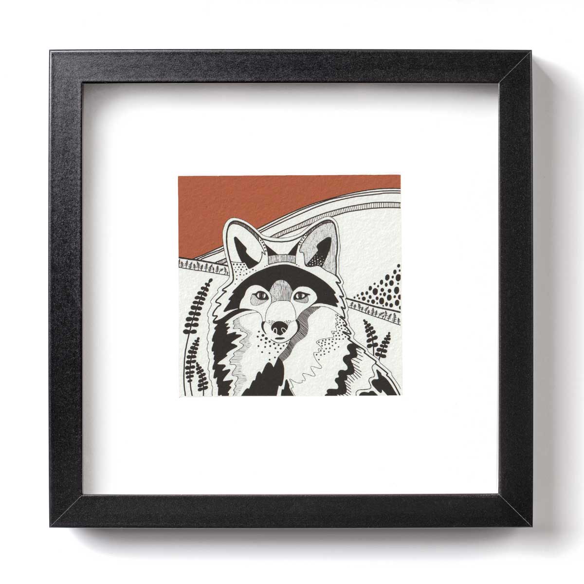 Ink illustration of a fox with a block colour russet sky