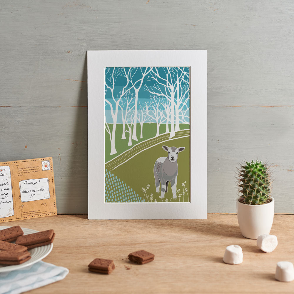 Spring lamb illustration in muted blues, greens and greys