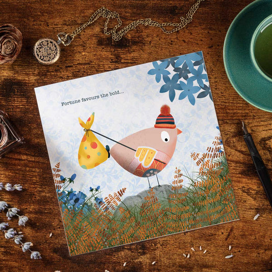 greeting card with an illustration of a birdie preparing to go on an adventure