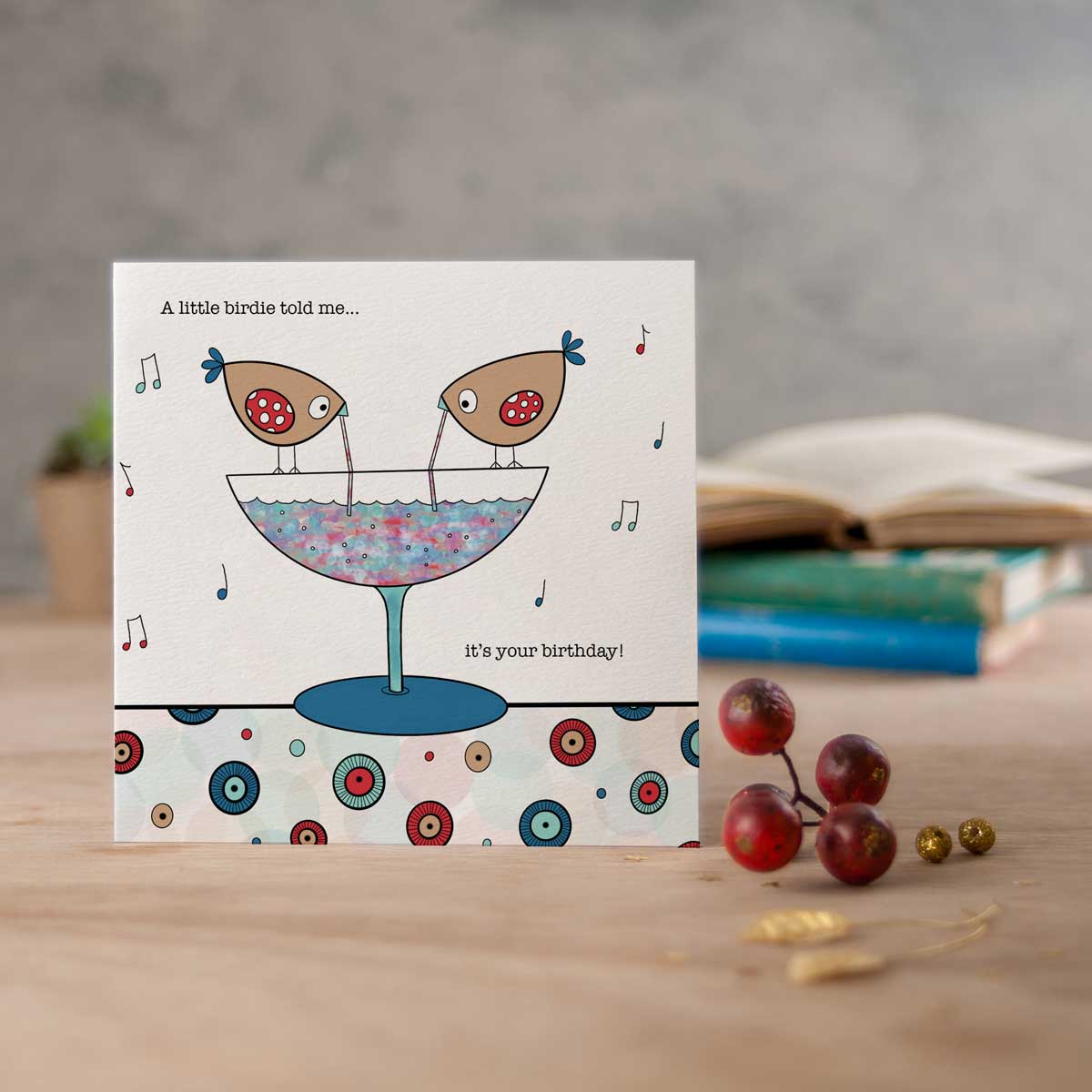 square card with two birdies drinking a cocktail and the words a little birdie told me it was your birthday!
