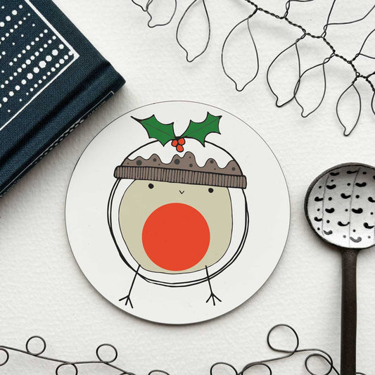 circular coaster with an illustration of a blob bird dressed as a christmas pudding