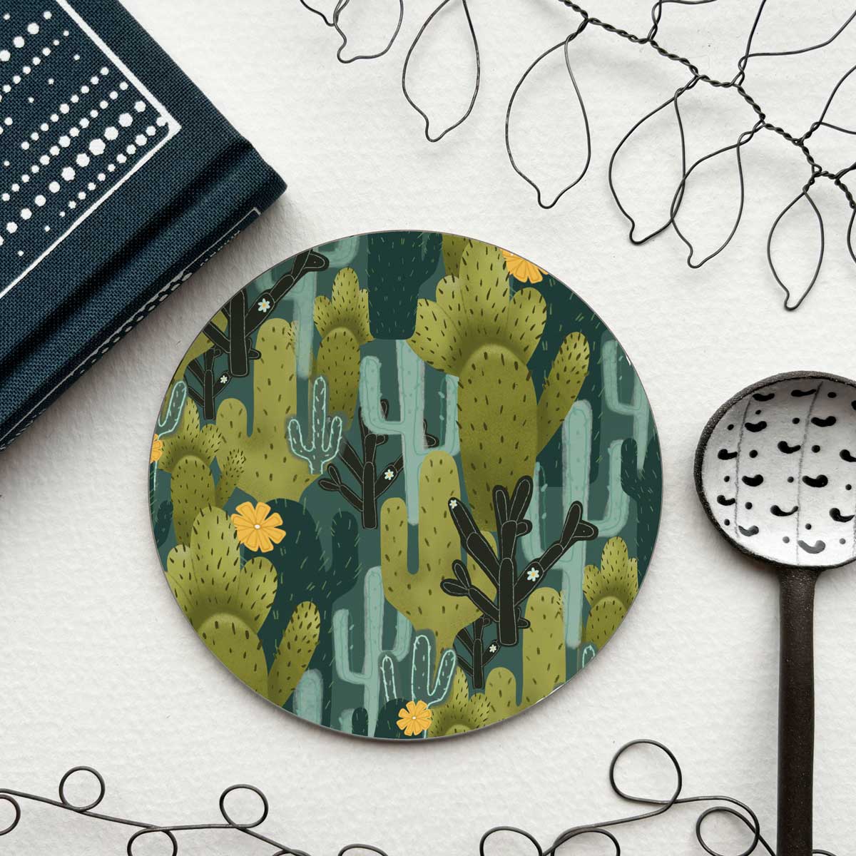 circular coaster with cacti pattern