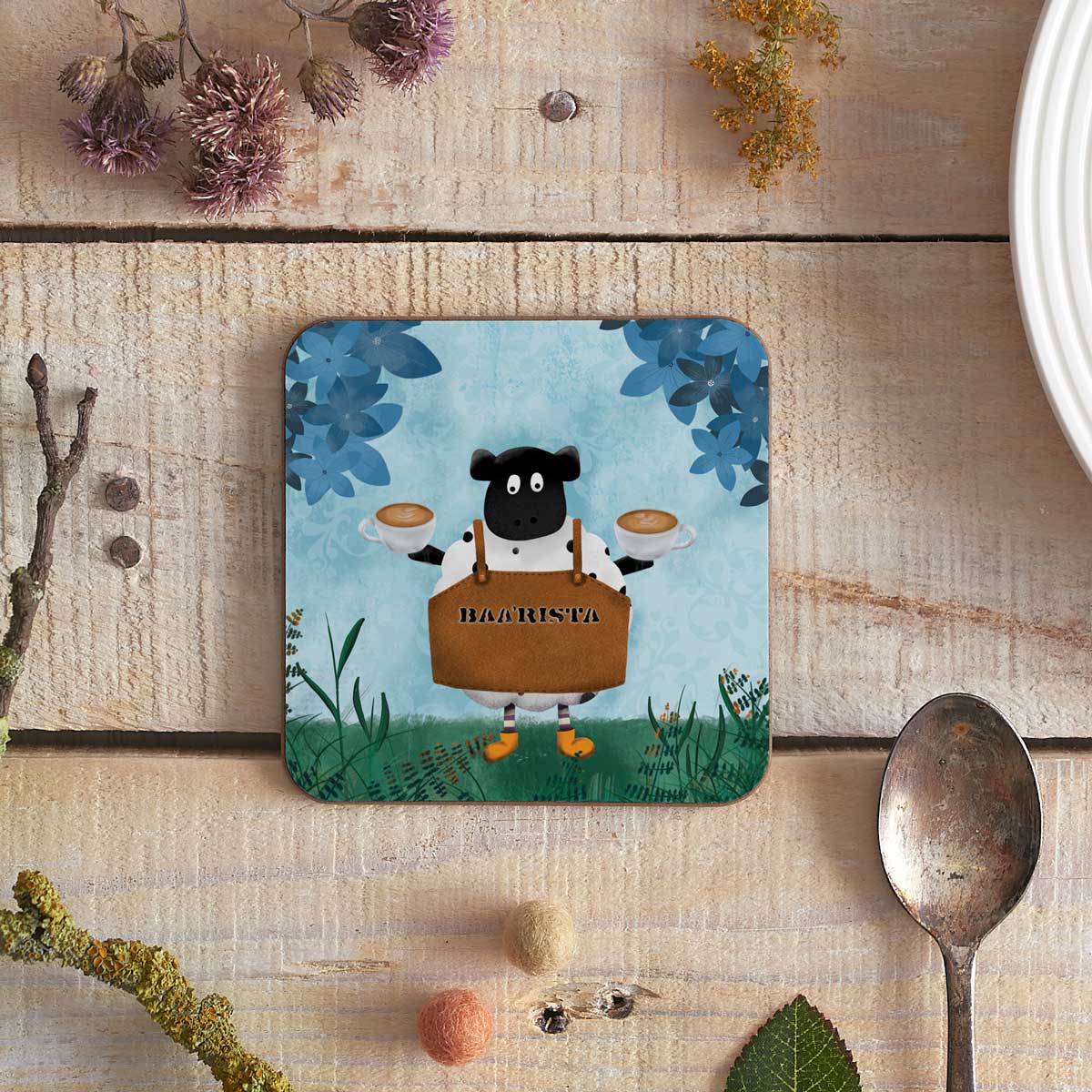 square coaster with baa'rista sheep illustration