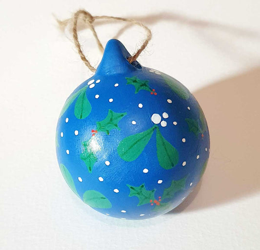 hand painted bauble with mistletoe and holly design