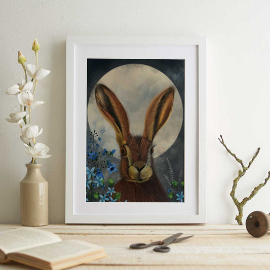 Coloured pencil illustration of a hare sitting in front of a full moon