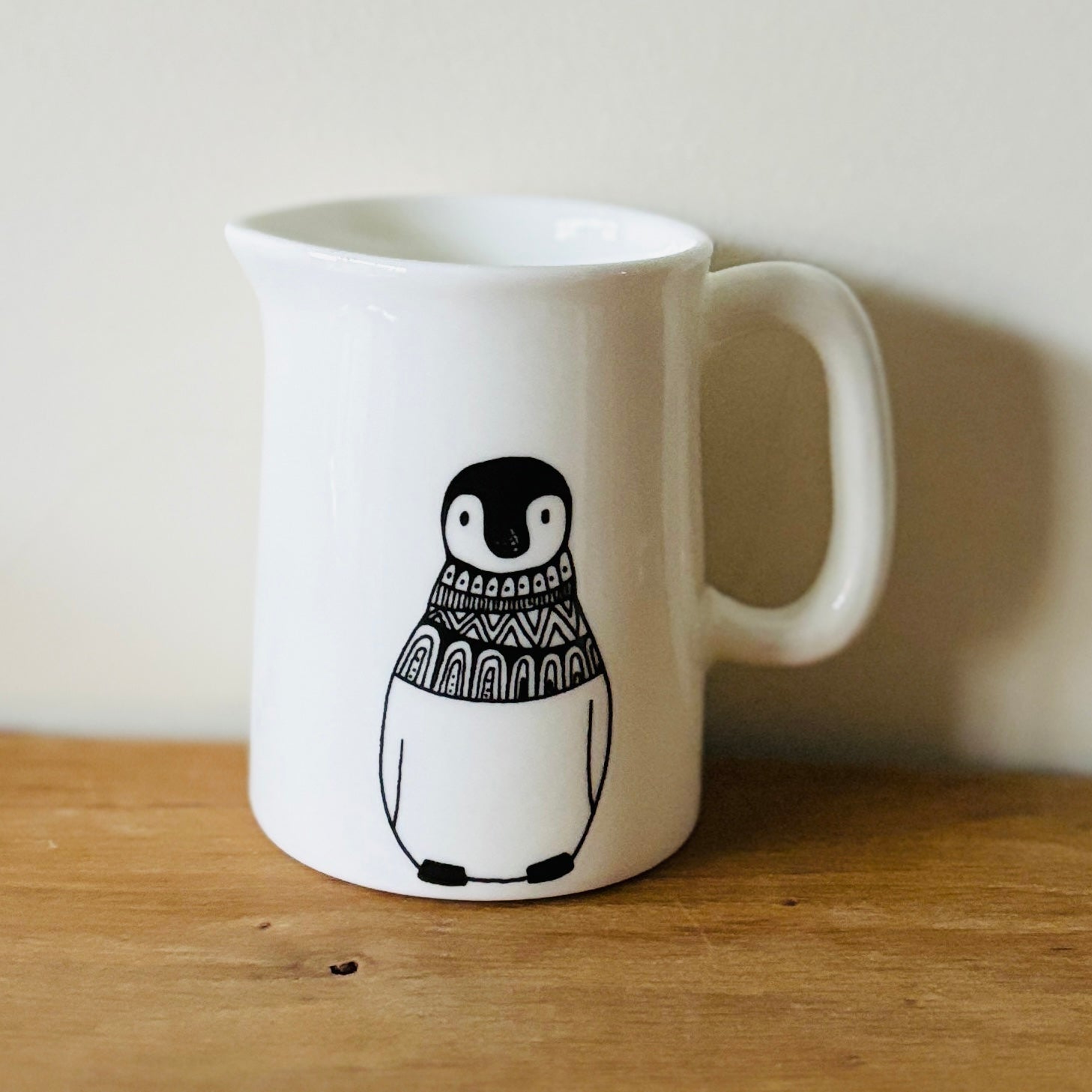 fine china mini jug with penguin illustration