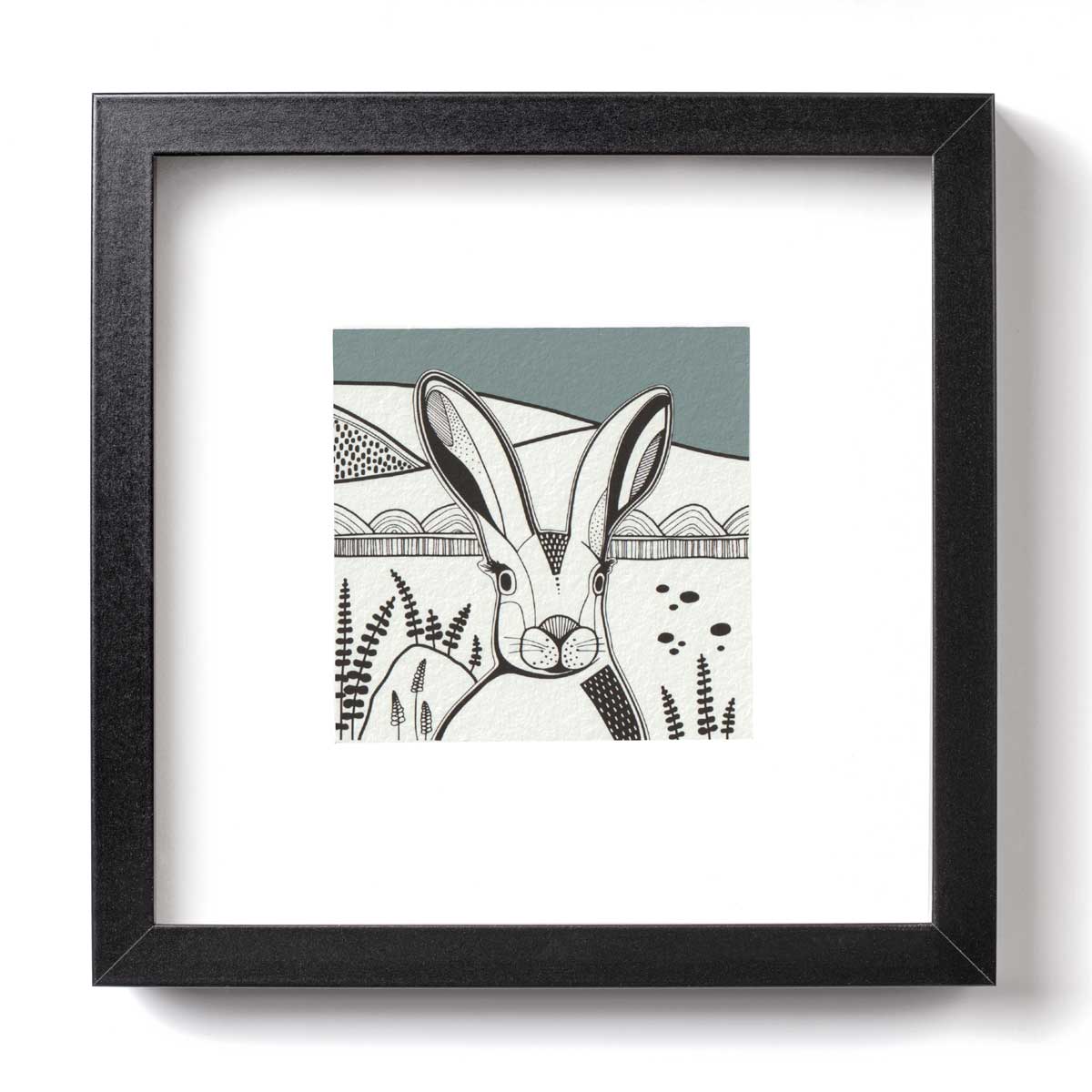Black and white illustration of a hare with an eggshell blue sky