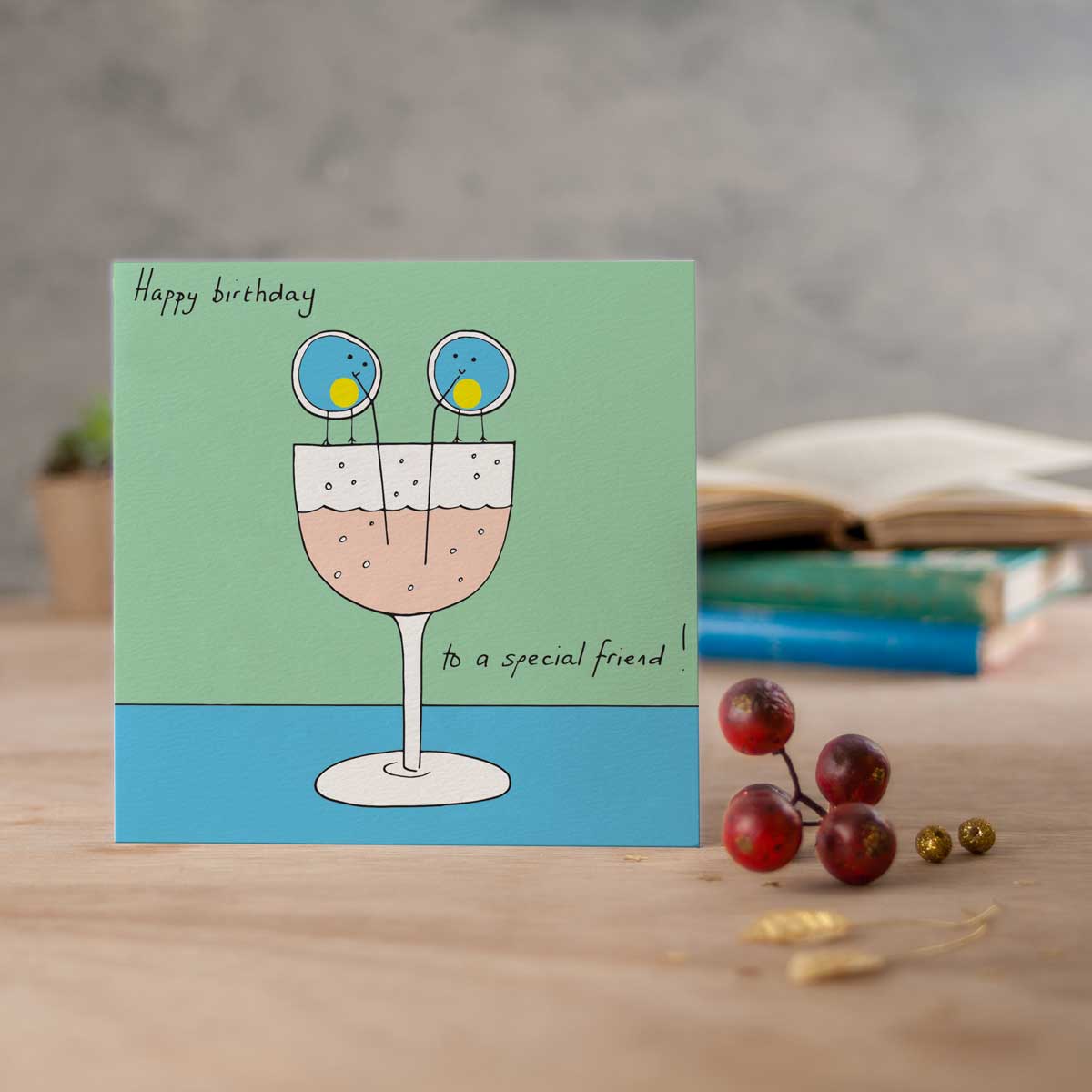 square card with two blob birds enjoying a cocktail and the words happy birthday to a special friend