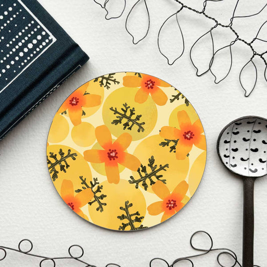 circular coaster with yellow and orange floral pattern