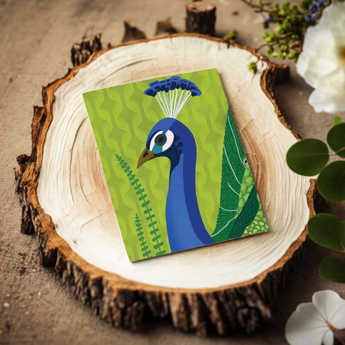 A6 greeting card with peacock illustration