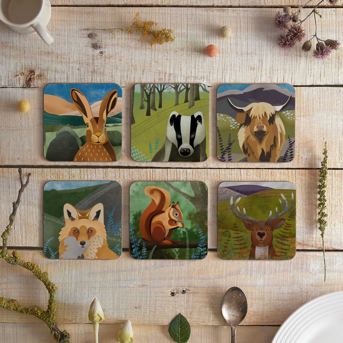 Set of six square coasters featuring wild animal illustrations