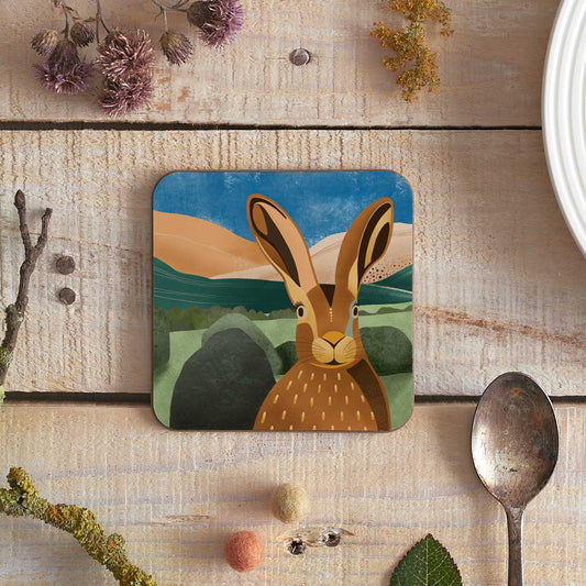 square coaster with illustration of a hare near castlerigg stone circle
