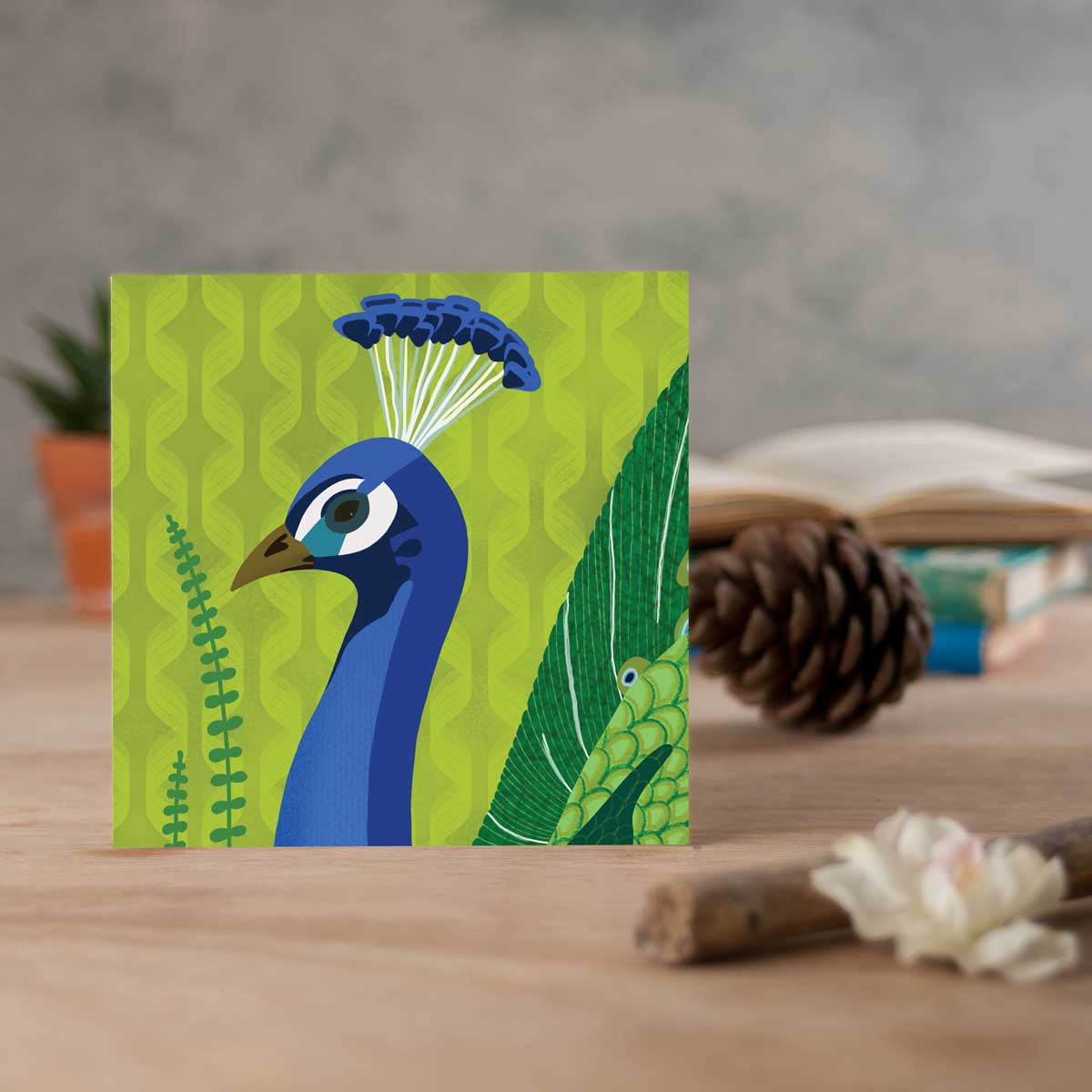 greeting card with peacock illustration