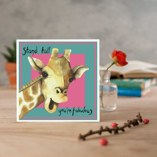 greetings card with giraffe illustration saying stand tall you're fabulous