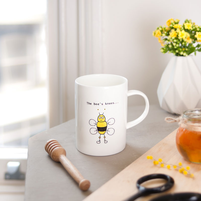 half pint fine china mug with illustration showing a bee with little yellow knees