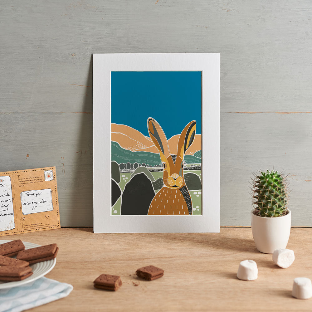 Hare artwork shown in a home setting